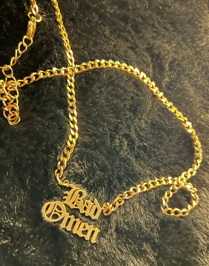 BAD OMEN Kette - gold/silber